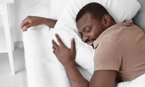 Relaxed individual sleeping soundly