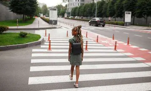 Person crossing a city street