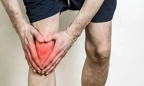 Knee pain highlighted by red area.