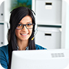 Smiling office worker with headphones