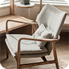 Wooden chair with beige cushions