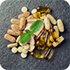 Vitamins and supplements on a dark surface