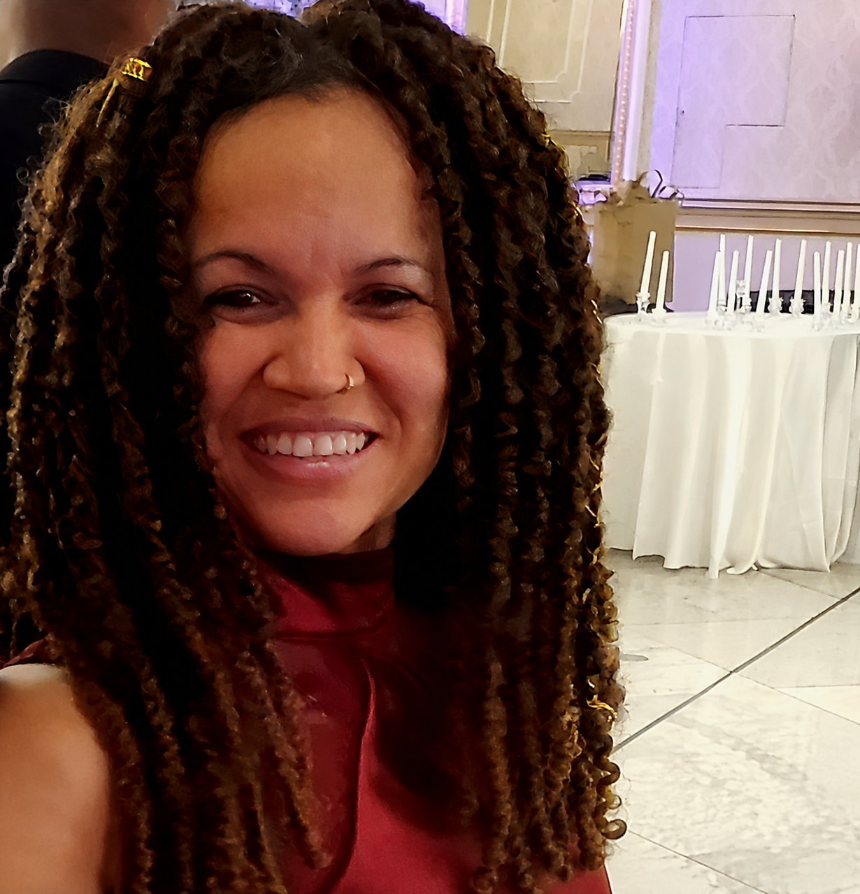 Happy individual at a formal gathering.