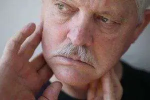 Pensive man with mustache close-up