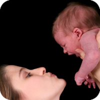 Parent holding baby lovingly