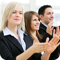 Business professionals applauding enthusiastically