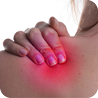 Hand touching painful shoulder spot