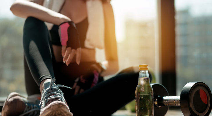 Athlete relaxing in gym setting