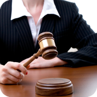 Lawyer with gavel at desk