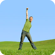 Man celebrating in green field