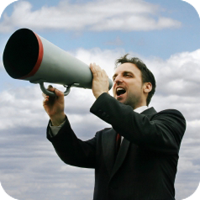Man shouting through megaphone outdoors