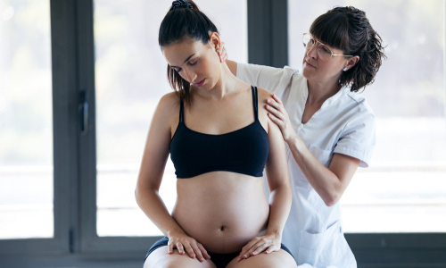 Maternity massage therapy session