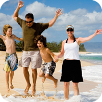 Happy family enjoying a beach day