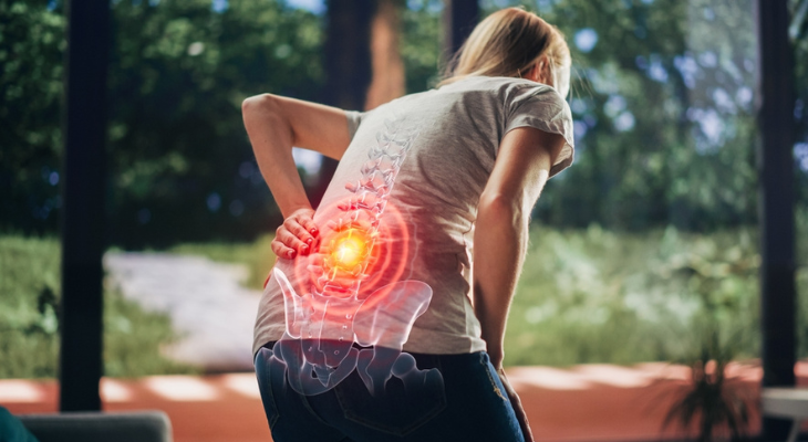 Person experiencing lower back pain