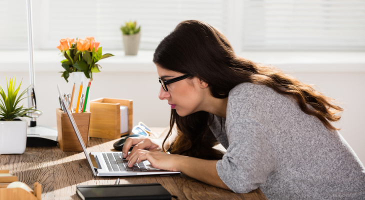 Woman focused on laptop work