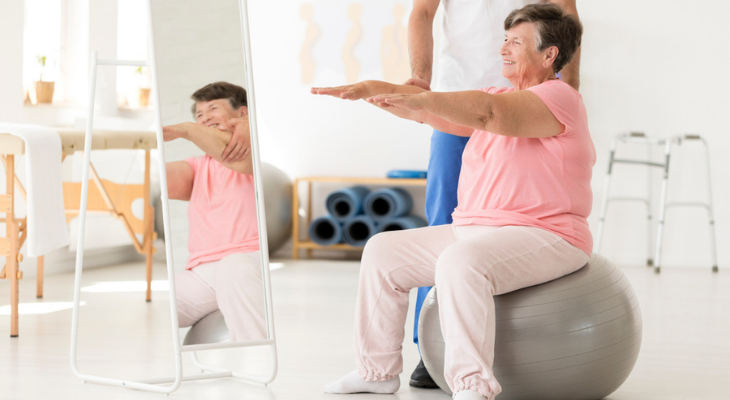 Woman exercising on stability ball