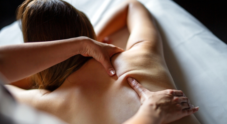 Woman receiving a relaxing back massage