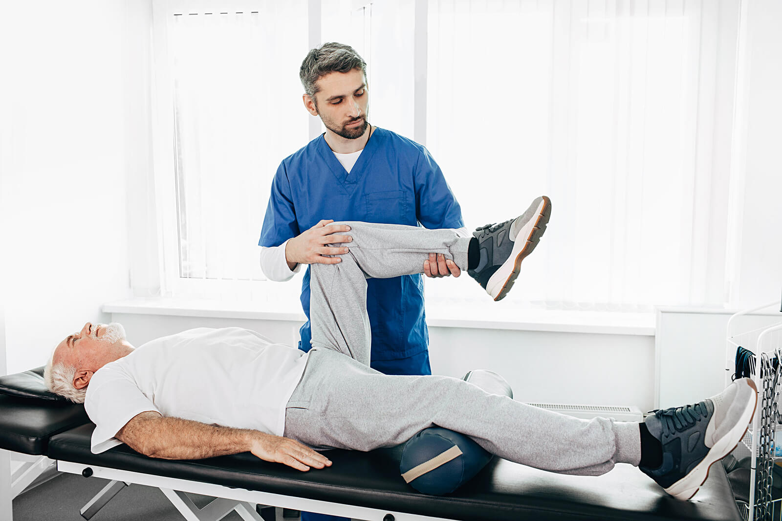 Physiotherapy session with senior patient