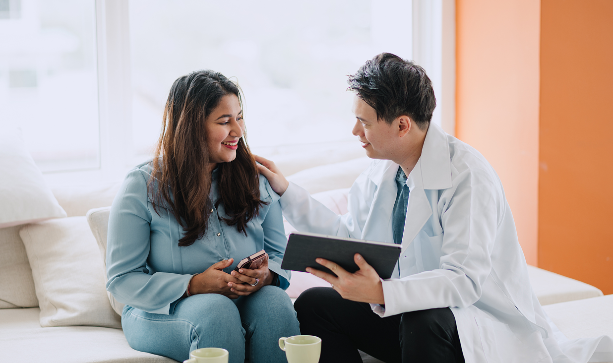 Medical professional discussing with patient