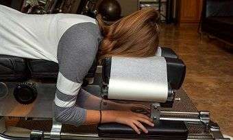 Person on chiropractic adjustment table