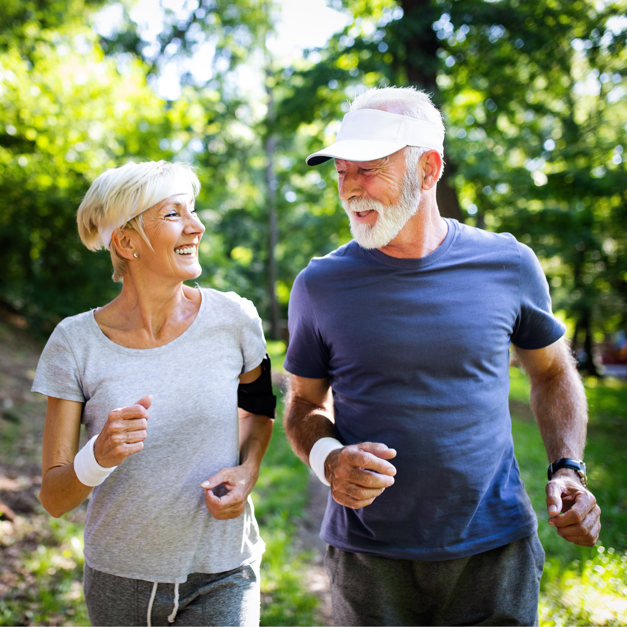 Senior couple jogging in the park