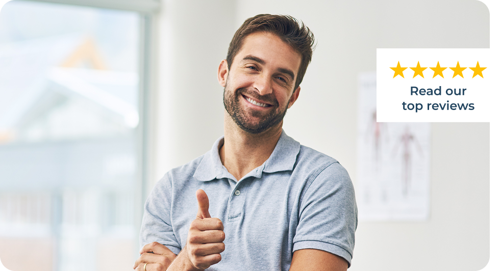 Smiling man giving thumbs up