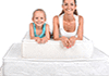 Woman and child lying on bed