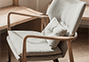 Wooden chair with beige cushions