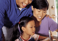 Family reading book together