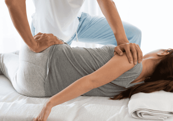 Therapeutic back adjustment session