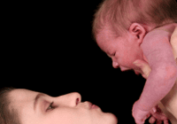 Parent holding baby lovingly