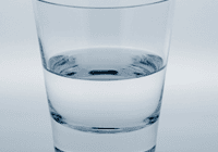 Glass of water on table