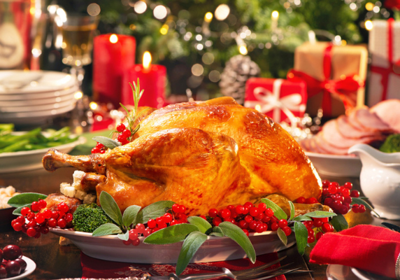 Festive holiday dinner with roasted turkey
