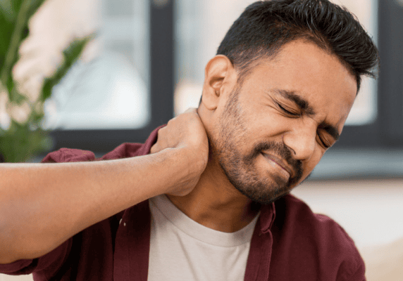 Man experiencing neck pain