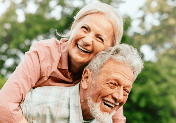 Happy senior couple enjoying outdoors
