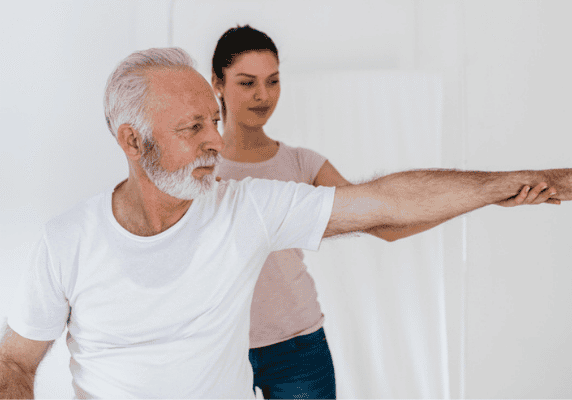Elderly man doing arm exercises