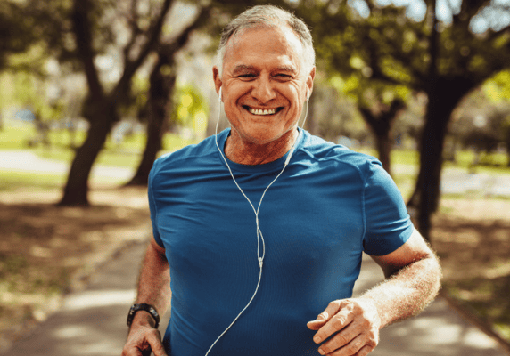 Smiling runner enjoying outdoor exercise