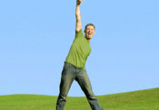Man celebrating in green field