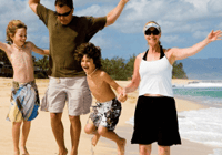 Happy family enjoying a beach day