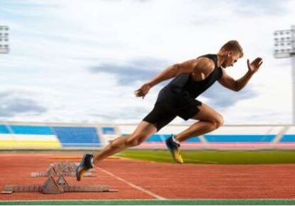 Runner in motion at stadium