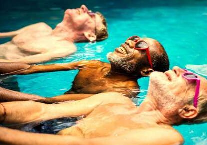 Elderly men enjoying a swim