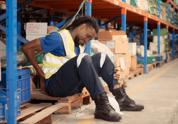 Worker in safety vest taking break