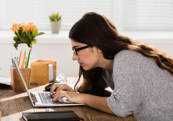 Woman focused on laptop work