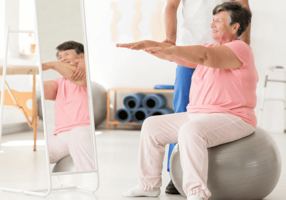 Woman exercising on stability ball