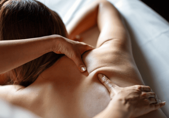 Woman receiving a relaxing back massage