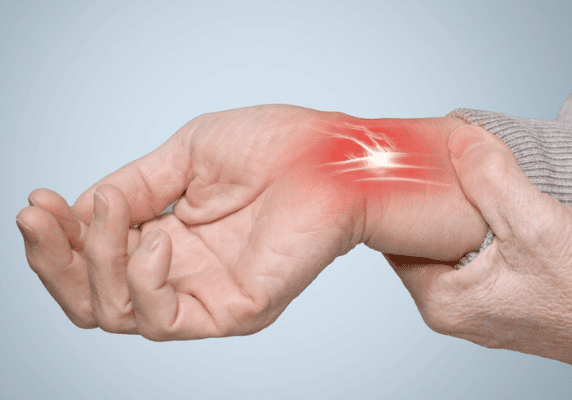 Hand holding painful wrist